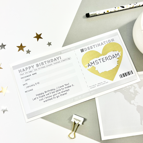 Grey bording pass scratch card, perfect to surprise a loved one with a trip for their birthday. Made and shipped from Ireland